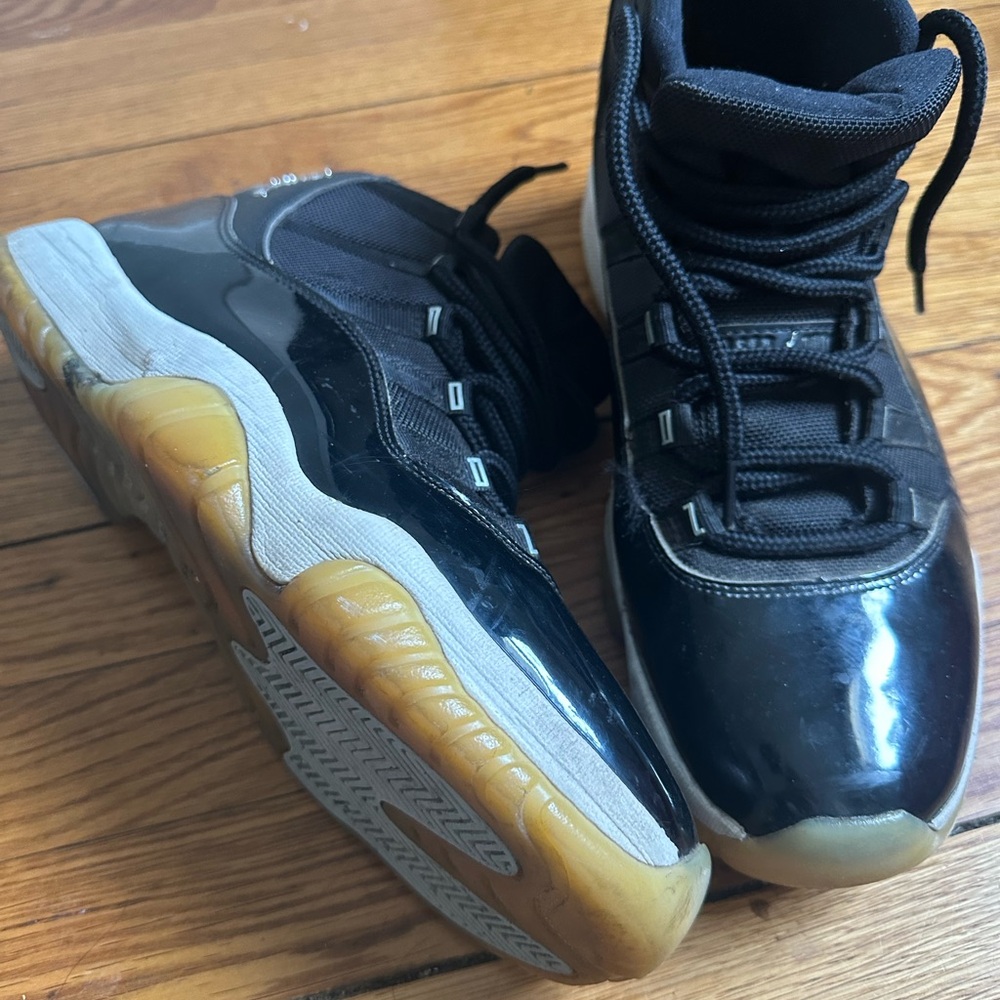 Jordan’s 11 Black High-Top Sneakers